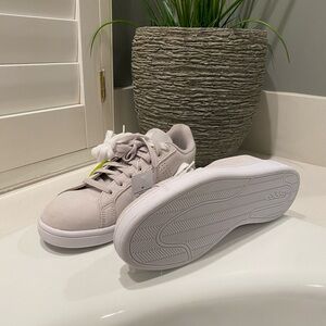 Adidas sneakers , brand new with tag, women size 11 .